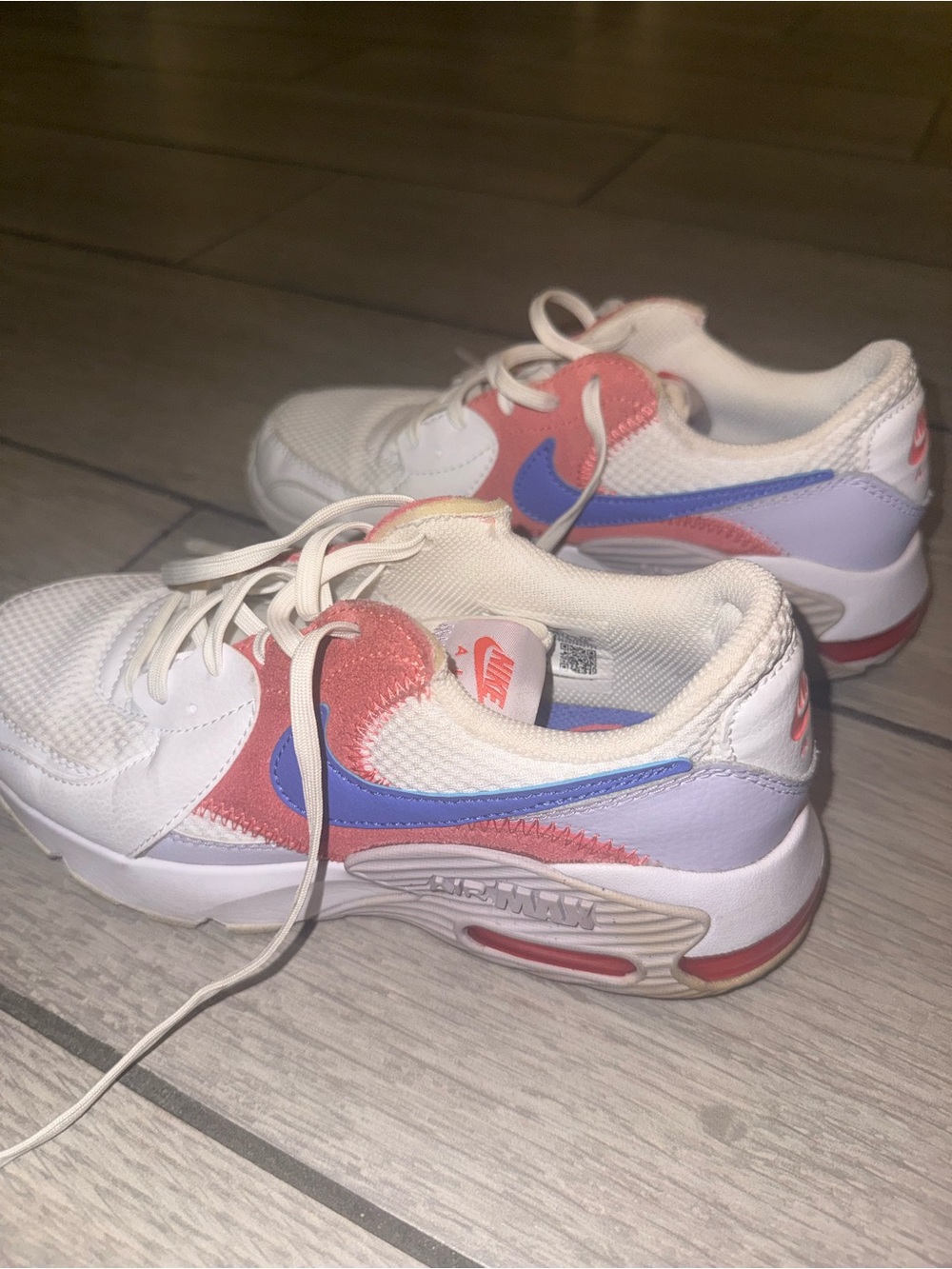 Nike White Sneakers with Purple Insole and Red Accent